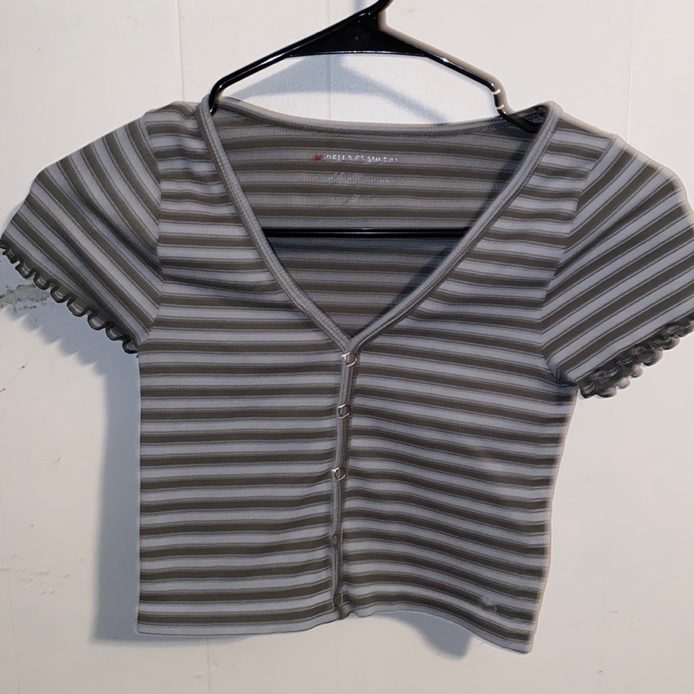 From Ross has been worn so the I don’t know the brand still in amazing shape